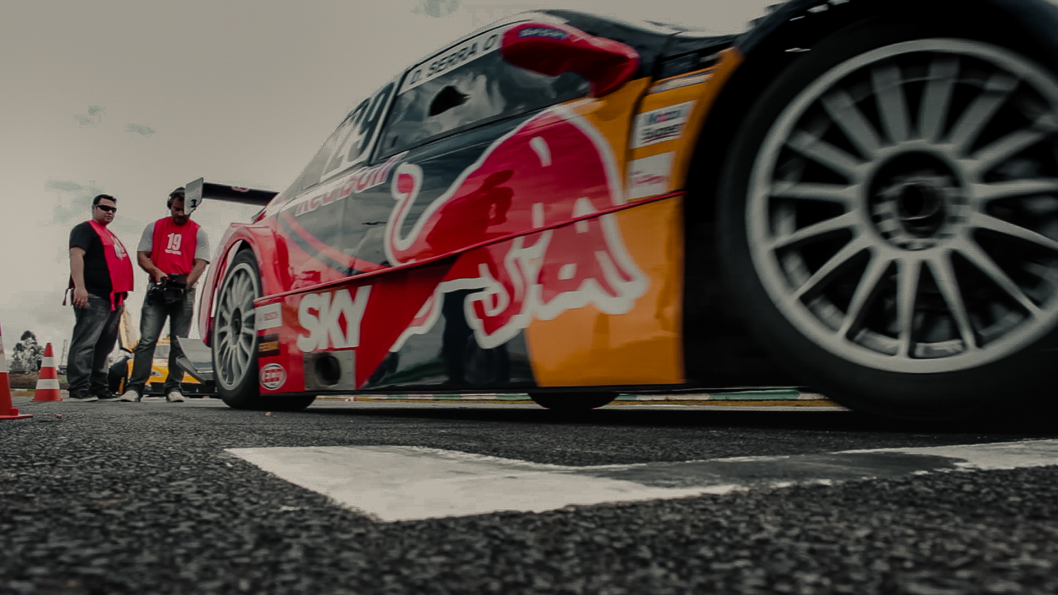 Red Bull Racing stock car photographed low at track level